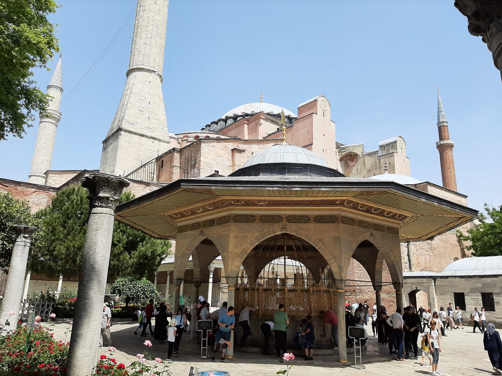 The Hagia Sophia exterior in Sultanahmet — the central dome and four minarets of the Istanbul mosque-cathedral against an open sky